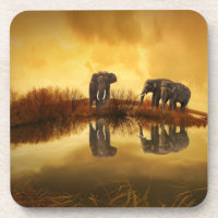 Asian Elephants in Thailand under a glowing sunset