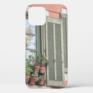 ASSORTED-COLOR FLOWERS IN VASE NEAR WINDOW iPhone 12 CASE