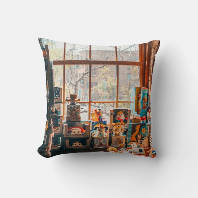 ASSORTED PLUSH TOYS ON BROWN WOODEN SHELF CUSHION (Front)