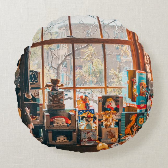 ASSORTED PLUSH TOYS ON BROWN WOODEN SHELF ROUND CUSHION (Front)