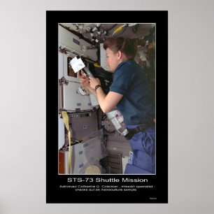 Astronaut Catherine G. Coleman checks Astroculture Poster