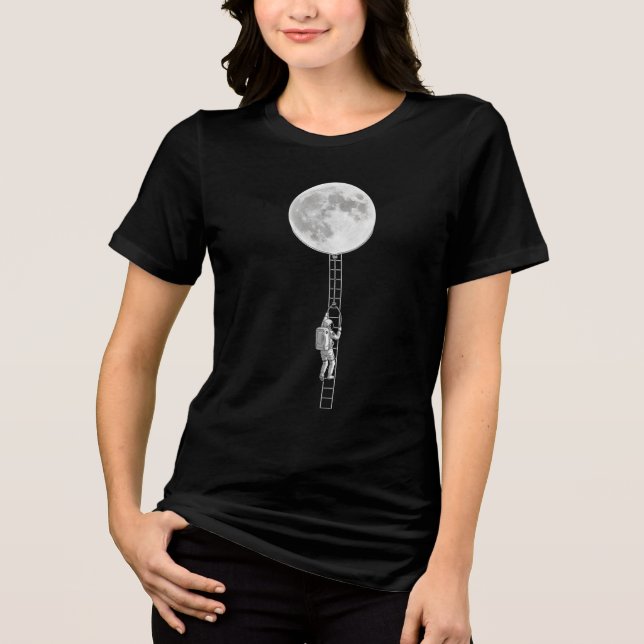 Astronaut Climbing the Moon – Surreal Space Art Tri-Blend Shirt (Front)