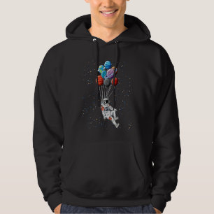 Astronaut Flying with Planet Balloons Floating in  Hoodie