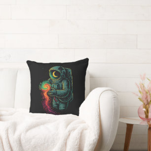 Astronaut Holding a Cosmic Spiral Cushion