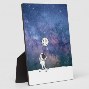 Astronaut in space with moon balloon cosmos stars plaque