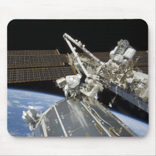 Astronauts perform a series of tasks mouse pad