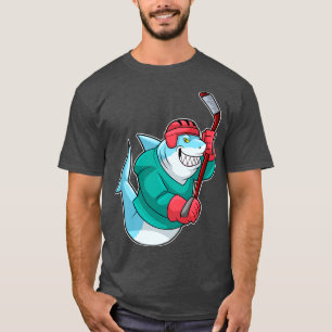 at Ice hockey with Ice hockey stick Helmet T-Shirt