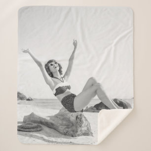 Attractive young woman in bikini on the beachvinta sherpa blanket