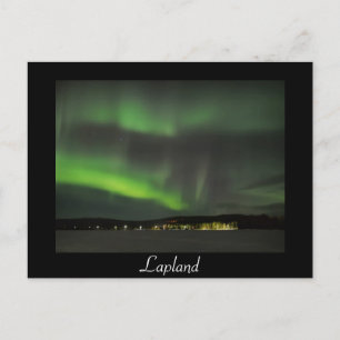 Aurora borealis in the sky black text postcard