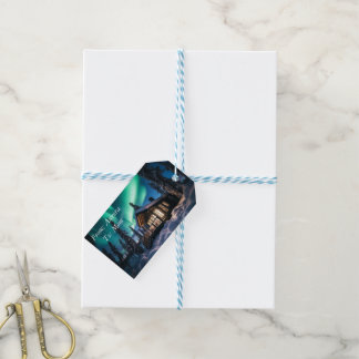 Aurora borealis over winter cabin gift tags
