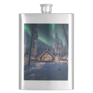 Aurora borealis over winter cabin hip flask