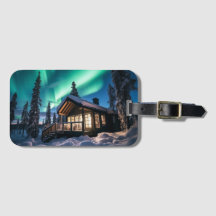 Aurora borealis over winter cabin