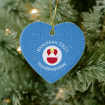 Austrian Angel Hanukkah Flag Personalized  Ceramic Tree Decoration<br><div class="desc">Designed for families of mixed religions, this heart shaped ceramic ornament shows an angel wearing the red and white Flag of Austria on a Hanukkah inspired image. It features the angel flying in a white circle of squiggly squares surrounded by a background of blue squiggly squares. Personalize your Austrian angel...</div>