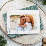 Autograph | Merry Christmas Photo Holiday Card<br><div class="desc">Send holiday greetings to friends and family in chic style with our elegant photo cards. Design features your favourite horizontal or landscape orientated photo framed by a thick white border, with "Merry Christmas" sketched on top in evergreen hand lettered script. Personalise with your family name and the year in the...</div>