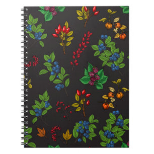 Autumn berries on chocolate brown notebook