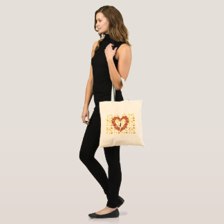 autumn crown on its bed of leaves tote bag