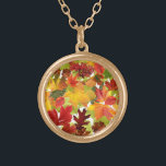 Autumn Fall Leaves Gold Plated Necklace<br><div class="desc">This exquisite digital artwork by Looly Elzayat features a captivating autumn leaves background vector, showcasing the vibrant hues of fall. The intricate design captures the essence of the season, with a harmonious blend of warm colours that evoke a sense of nostalgia and tranquillity. Ideal for various applications, this artwork adds...</div>