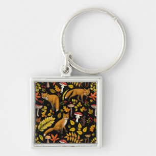 Autumn foxes on black key ring