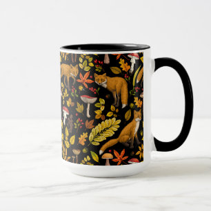 Autumn foxes on black mug