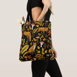 Autumn foxes on black tote bag