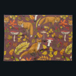 Autumn foxes on chocolate brown tea towel<br><div class="desc">Hand-painted autumn woodland fauna and flora- foxes,  forest leaves,  mushrooms and berries</div>