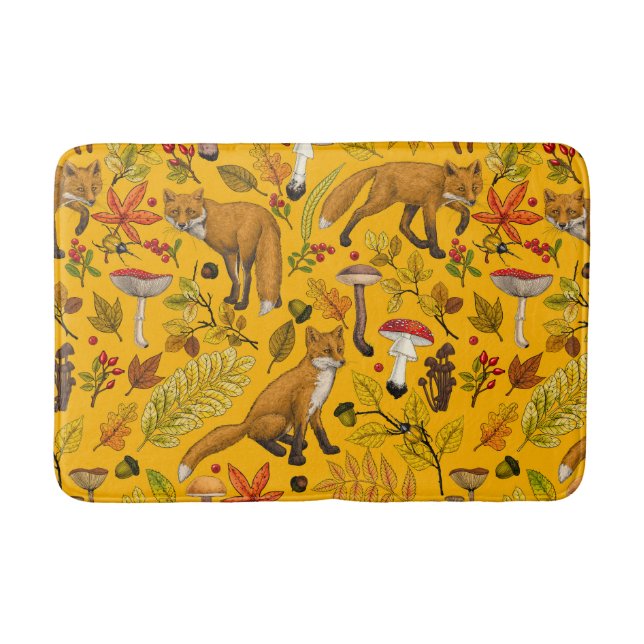 Autumn foxes on orange bath mat (Front)