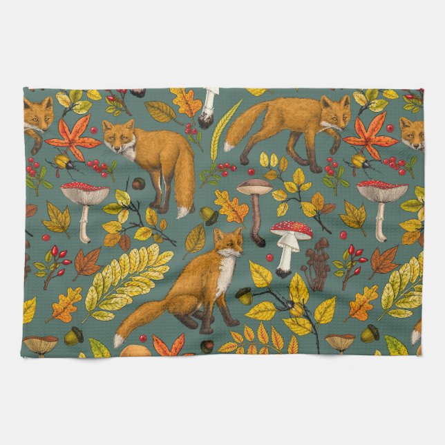 Autumn foxes on pine green tea towel (Horizontal)