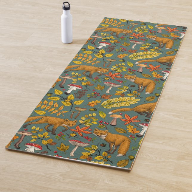 Autumn foxes on pine green yoga mat (In Situ)