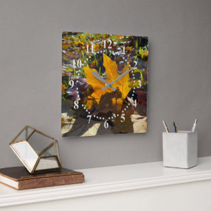 Autumn leaf in the sun square wall clock