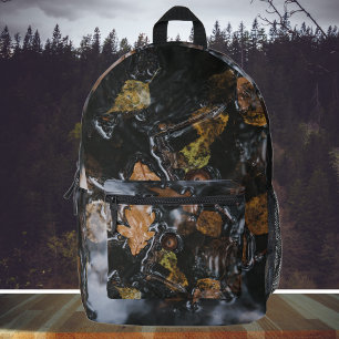 Autumn leaves and acorns in mysterious waters printed backpack