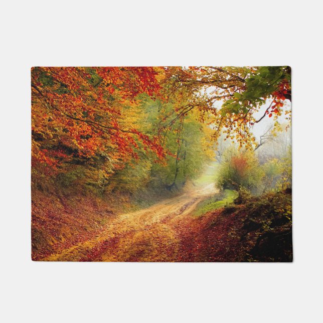Autumn Leaves and Trees Covering Dirt Road Doormat (Front)