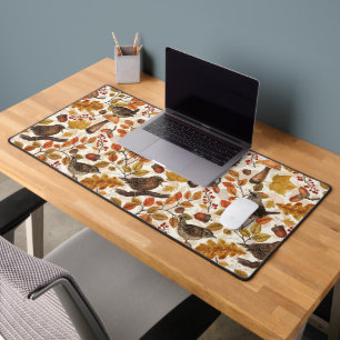 Autumn leaves, berries, mushrooms and wrens desk mat