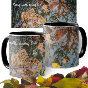 Autumn leaves in the in the clear forest stream mug