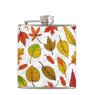 Autumn leaves on white hip flask