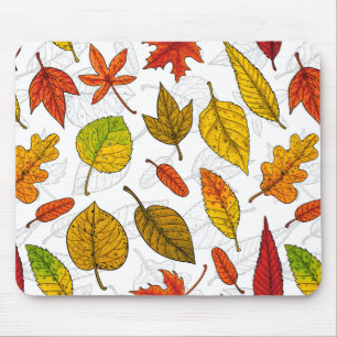 Autumn leaves on white mouse pad