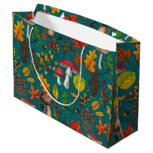 Autumn mushrooms, leaves, nuts and berries on blue large gift bag
