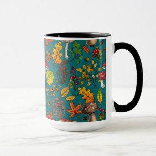 Autumn mushrooms, leaves, nuts and berries on blue mug