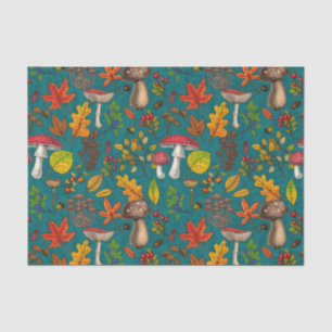 Autumn mushrooms, leaves, nuts and berries on blue tissue paper