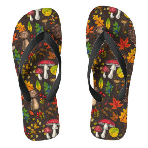 Autumn mushrooms, leaves, nuts and berries on dark jandals