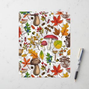 Autumn mushrooms, leaves, nuts and berries on whit