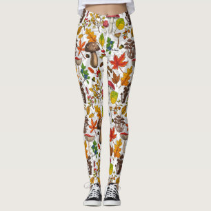 Autumn mushrooms, leaves, nuts and berries on whit leggings