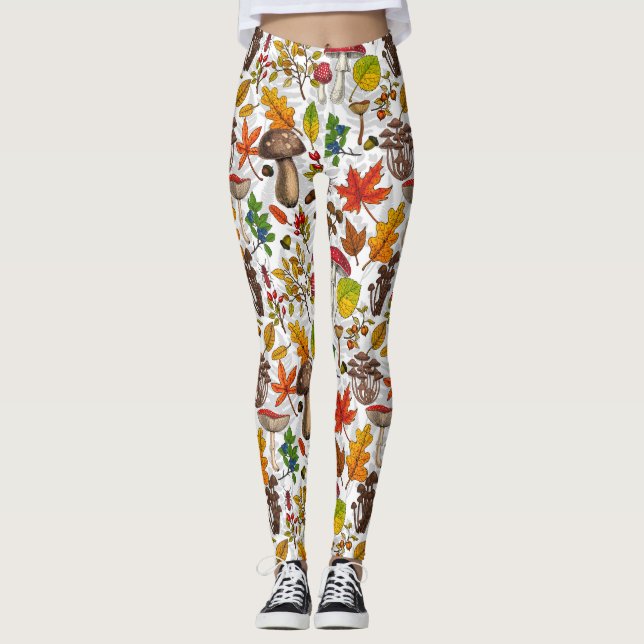 Autumn mushrooms, leaves, nuts and berries on whit leggings (Front)