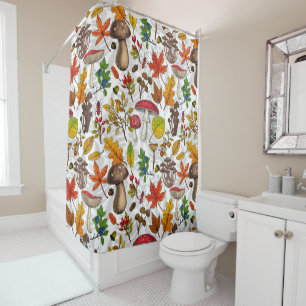 Autumn mushrooms, leaves, nuts and berries on whit shower curtain