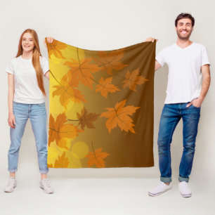 Autumn pattern with falling maple leaves and bokeh fleece blanket
