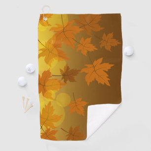 Autumn pattern with falling maple leaves and bokeh golf towel