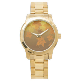 Autumn pattern with falling maple leaves and bokeh watch