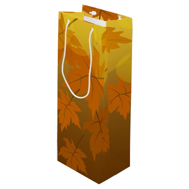 Autumn pattern with falling maple leaves and bokeh wine gift bag (Front Angled)