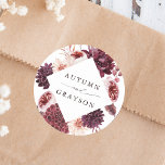 Autumn Romance Watercolor Floral Wedding  Classic Round Sticker<br><div class="desc">This wedding sticker features a watercolor flower wreath of dahlias,  garden roses,  and peony in burgundy red,  maroon,  blush pink over fall leaves with a diamond shape frame. For more advanced customisation of this design,  please click the BLUE DESIGN TOOL BUTTON. Matching items are also available.</div>