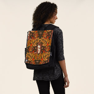 Autumn squirrel on dark brown backpack