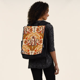 Autumn squirrel on off white backpack